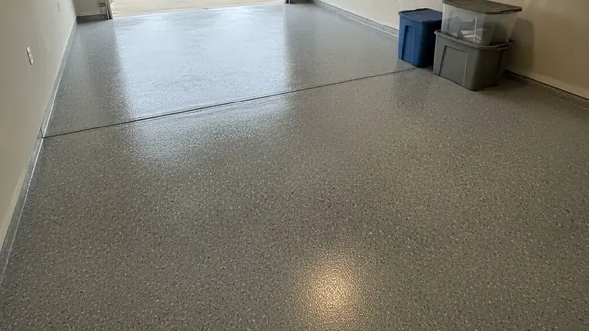 Illustrative garage floor coating surface used to explain preparation and finish choices for Kenosha homeowners
